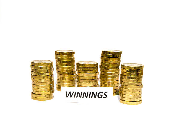 istock Winnings sign at coin piles 532057371