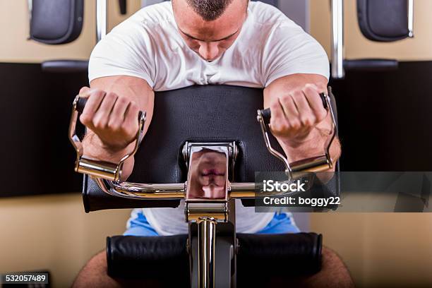 Young Man Training In The Gym Stock Photo - Download Image Now - 2015, Active Lifestyle, Activity