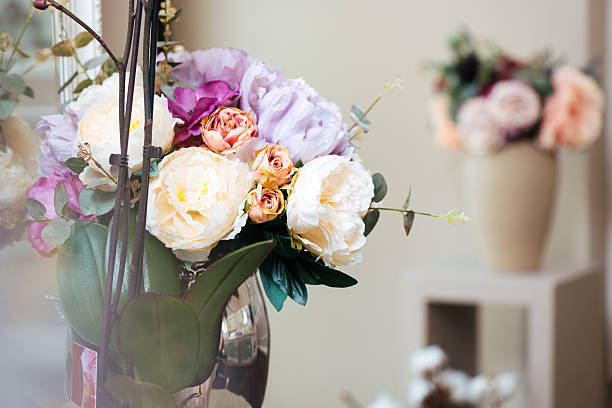 istock Beautiful fresh flowers in vases 532058528