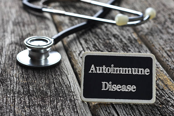 Medical Concept- Autoimmune Disease word written on blackboard w