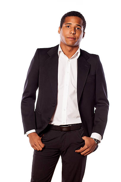 istock Handsome African businessman standing on white background 532059387