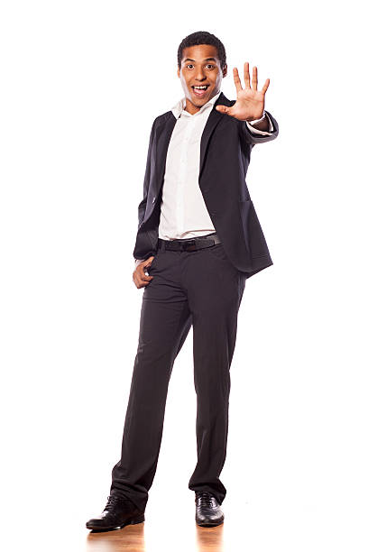 istock Happy african businessman waving his hand 532059393