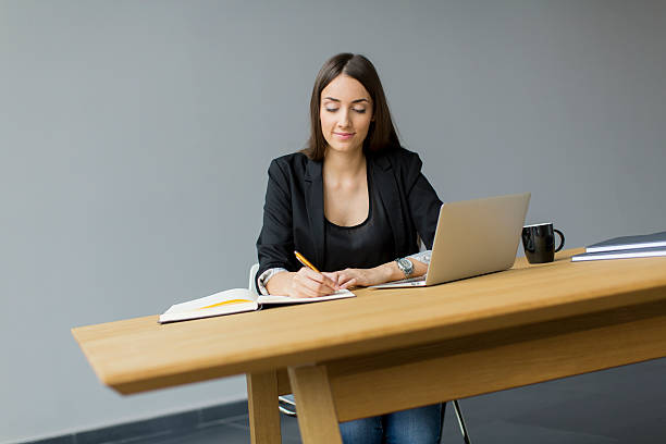 istock Young woman in the office 532087395