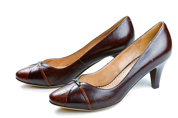 Brown female shoes isolated on a white background