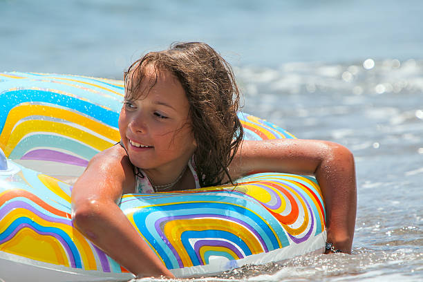istock Girl in the swimming circle 532089953