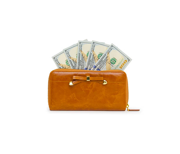 istock Purse with hundred dollar banknote isolated on white background 532090815