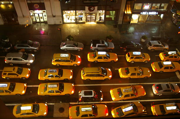 New York, USA - May 8, 2018: Streets of New York City's 6th and 7th Avenue in Lower Manhattan after working hours. While some parts of downtown districts are full of tourists exploring NYC, other  districts are busy with business people.
