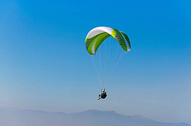 istock Sepia paraglide silhouette over Alps peaks 532091217