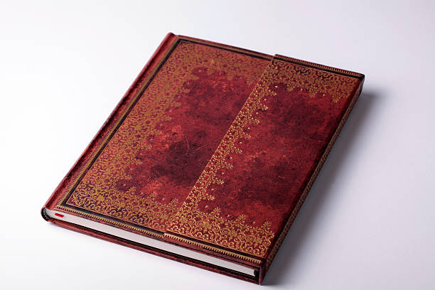 istock brown leather old note book with gold ornament 532091889