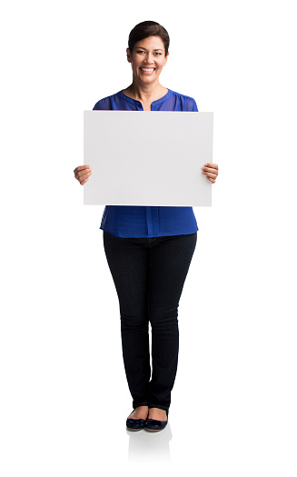 Portrait of a happy woman holding a blank whiteboard isolated over white background