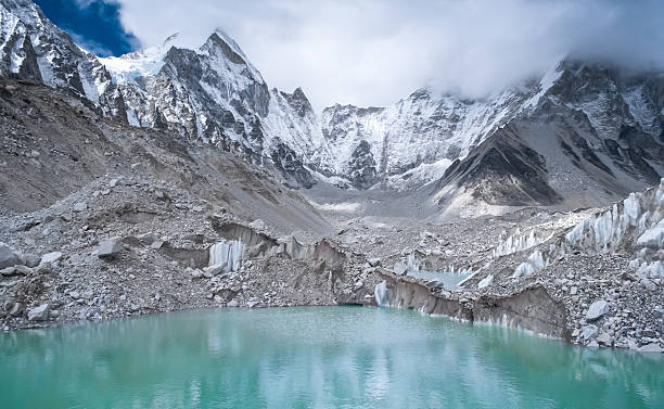 istock Beautiful snow-capped mountains with lake 532092659
