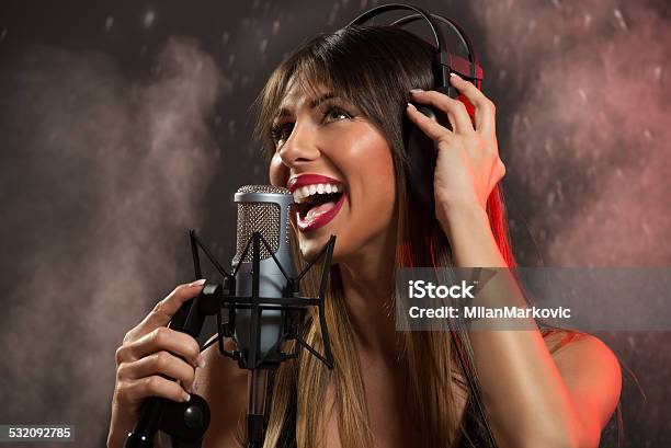 Recording A New Hit Song Stock Photo - Download Image Now - 2015, Adult, Adults Only