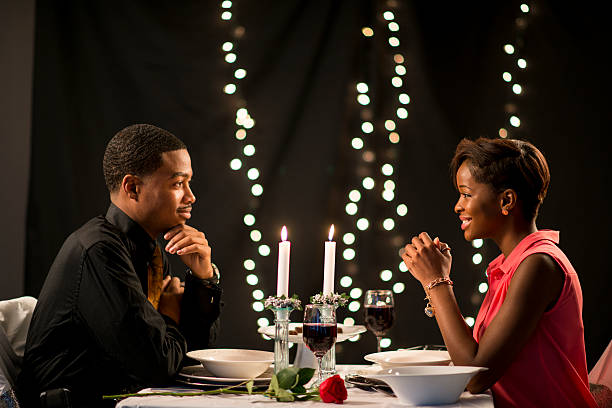 Out on a Date Couple on a Valentine's Day date candle light dinner stock pictures, royalty-free photos & images