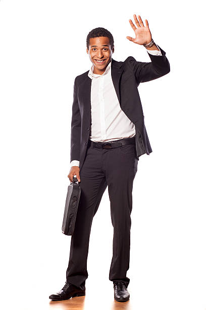 istock Happy african businessman waving his hand 532093741