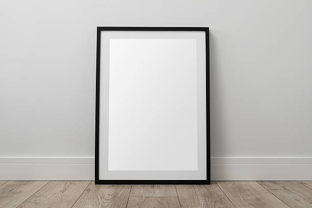 Blank picture frame Blank picture frame on the floor with copy space and clipping path for  the inside artists canvas photos stock pictures, royalty-free photos & images