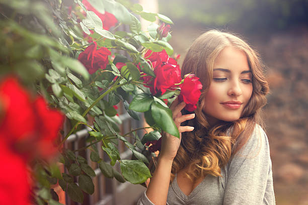 istock girl with roses 532104822