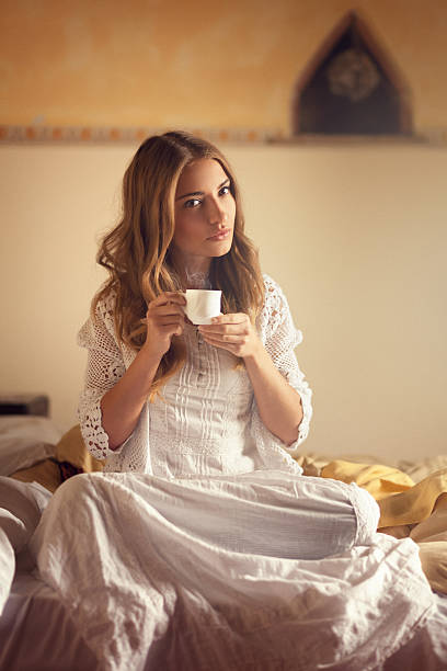 istock girl drinking coffee in bed 532105686