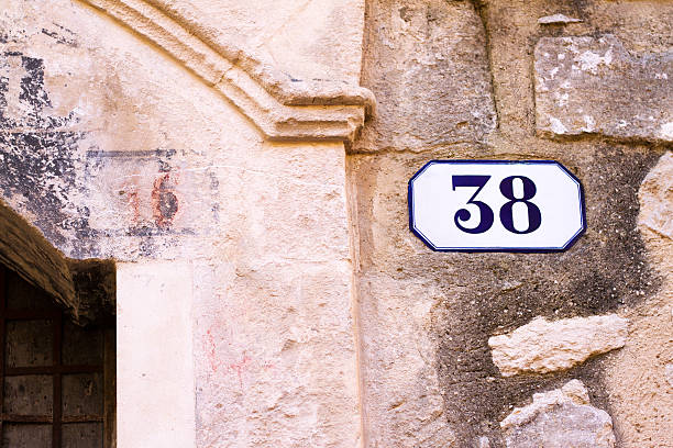 istock Number 38 Street Address Tile On Mottled Old Italian Wall 532107552