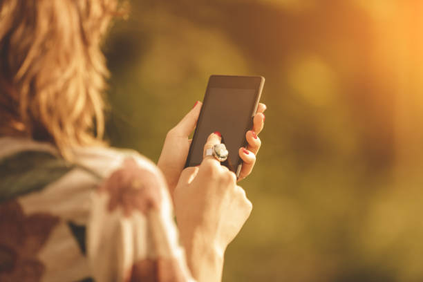 istock Urban girl holding a cellphone. 532108252