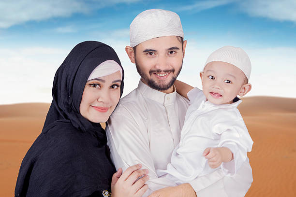 istock Arabic muslim family smiling at the camera 532108370