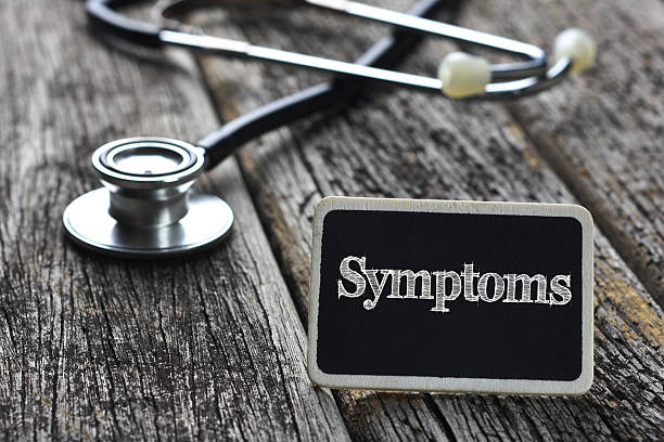 istock Medical Concept-Symptoms word written on blackboard with Stethos 532111184