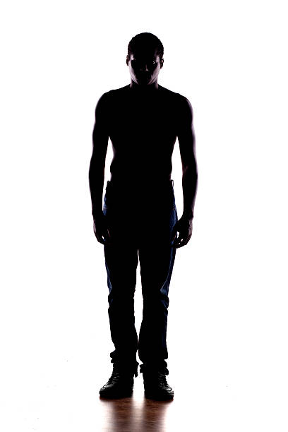 istock Silhouette of a half-naked African man on a white background 532111835