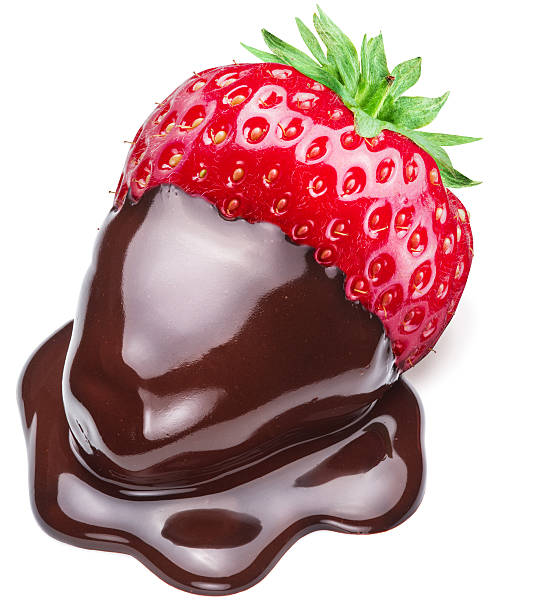 Strawberry dipped in chocolate fondue. Strawberry dipped in chocolate fondue on white background. chocolate covered strawberries stock pictures, royalty-free photos & images
