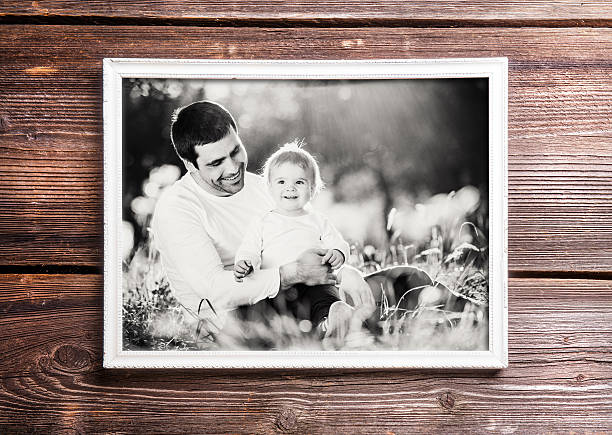 istock Fathers day composition. Picture frame. Wooden background. 532113724