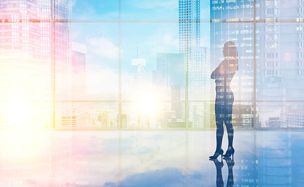 istock Businesswoman silhouette double exposure 532114666