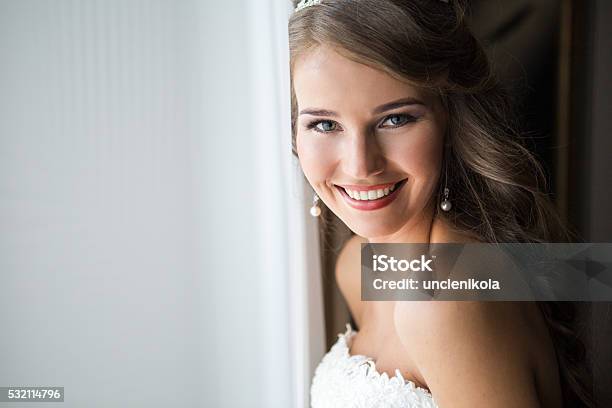 Happy Bride Smiling At The Camera Stock Photo - Download Image Now - Bride, Wedding, Jewelry