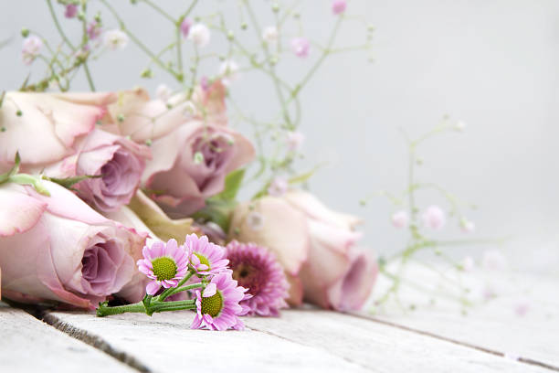 istock Still Life with pastel roses and daisies 532114820