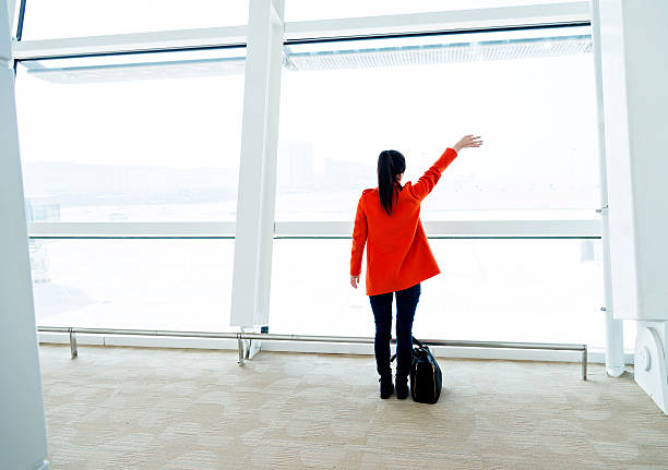 istock asian woman in airport 532114821