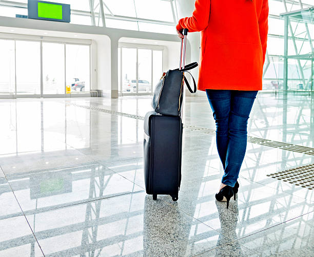 istock asian woman in airport 532114827