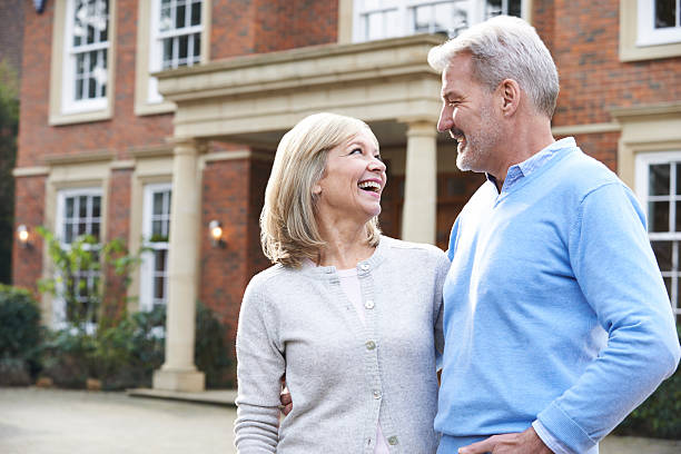 istock Mature Couple Standing Outside Home 532117374