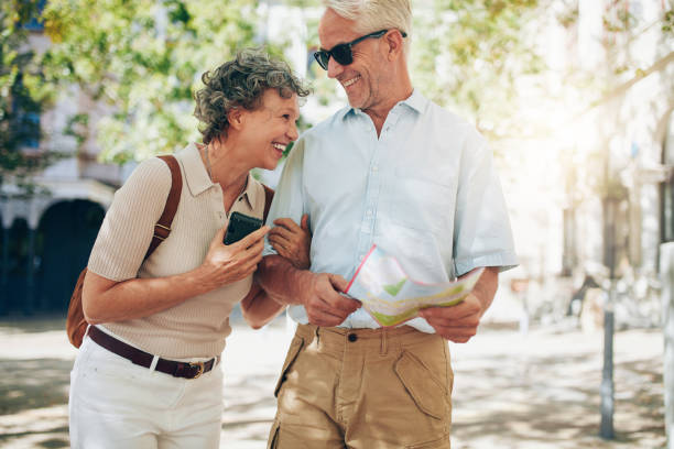 istock Retired couple walking around the town 532120368