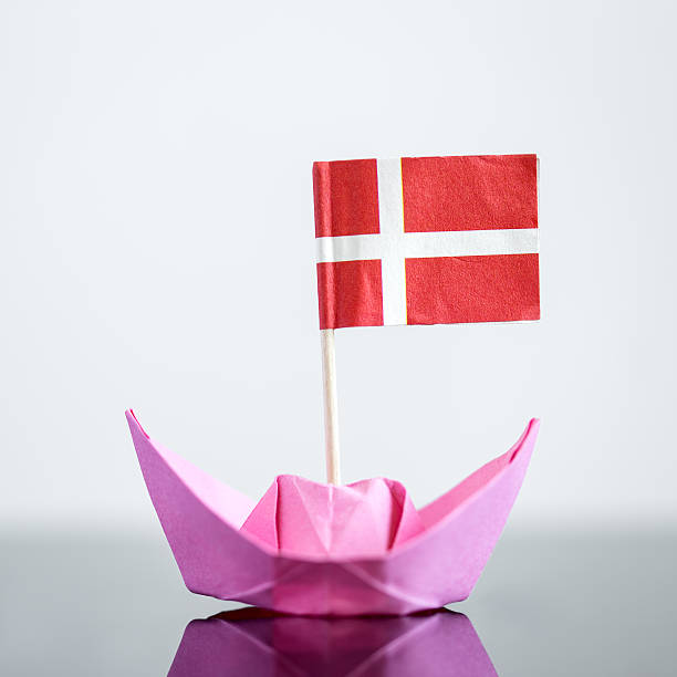 paper ship with danish flag, concept shipment or free trade agreement