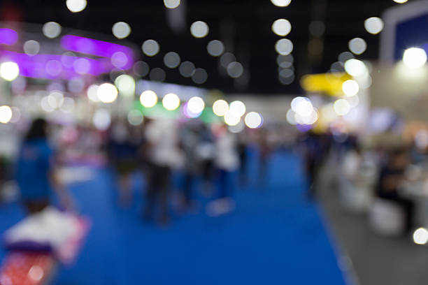 istock people in exhibition hall building, blur background 532123426