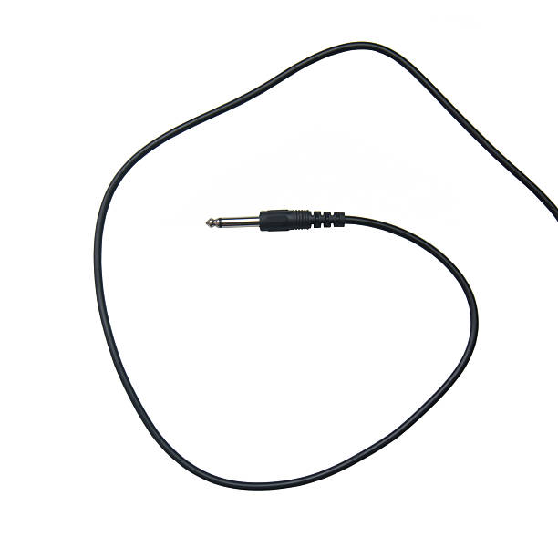 istock Guitar audio jack with black cable isolated on white background 532124696