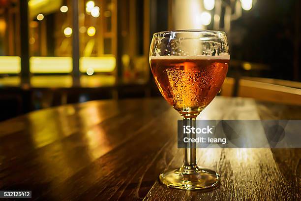 Vintage Glass Of Light Beer On A Pub Restaurant Stock Photo - Download Image Now - Alcohol - Drink, Bar - Drink Establishment, Beer - Alcohol