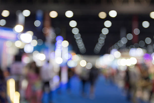 istock people in exhibition hall building, blur background 532125680