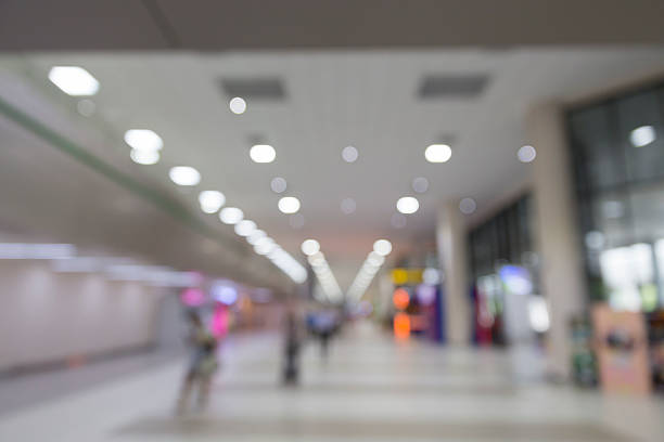 istock people in airport terminal, blur background 532125840