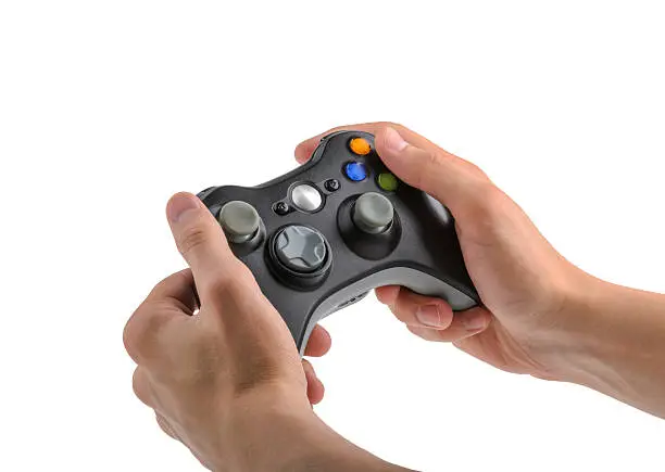 Photo of Male Hands Holding Gamepad isolated