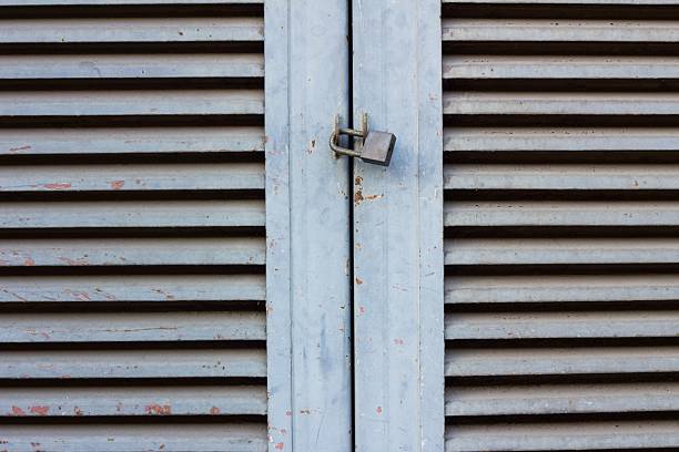 istock Old Key Lock on Close Wood Door 532129823