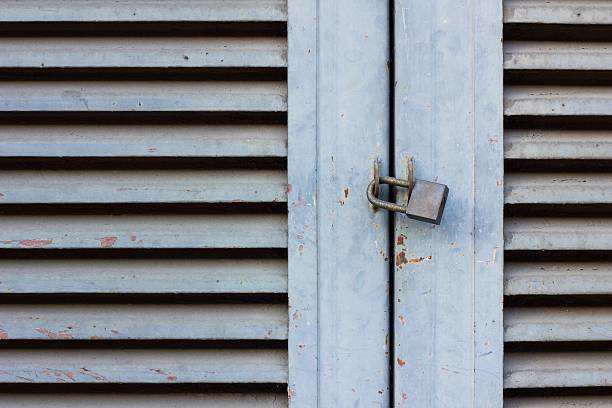 istock Old Key Lock on Close Wood Door 532129835