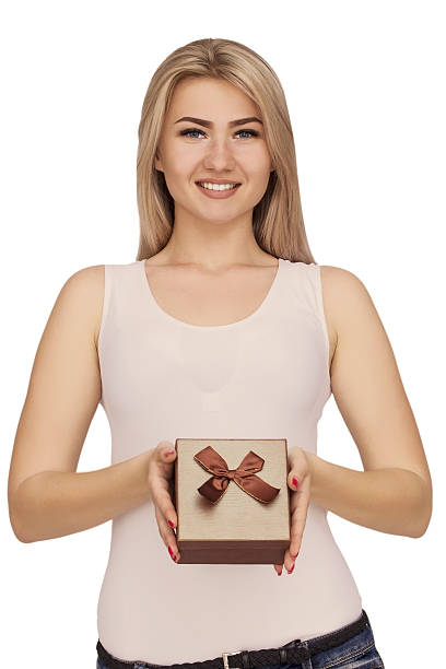 istock Young woman portrait holding gift 532131216