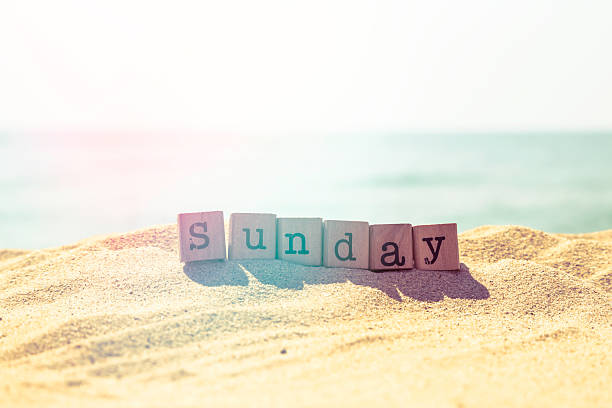 istock Sunday word on sea beach in retro style 532132839
