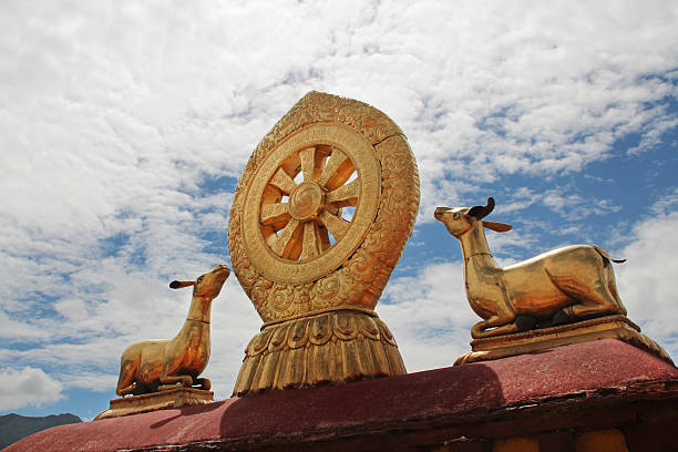 Gilded deers with dharmacakra on the top of the roof at Jokhang Temple in Lhasa, Tibet, China