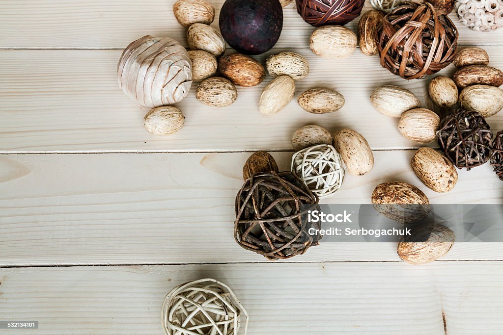 Brown rattan balls on old wooden background 2015 Stock Photo