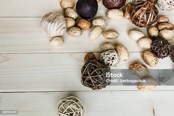 Brown Rattan Balls On Old Wooden Background Stock Photo - Download Image Now - 2015, Branch - Plant Part, Brown