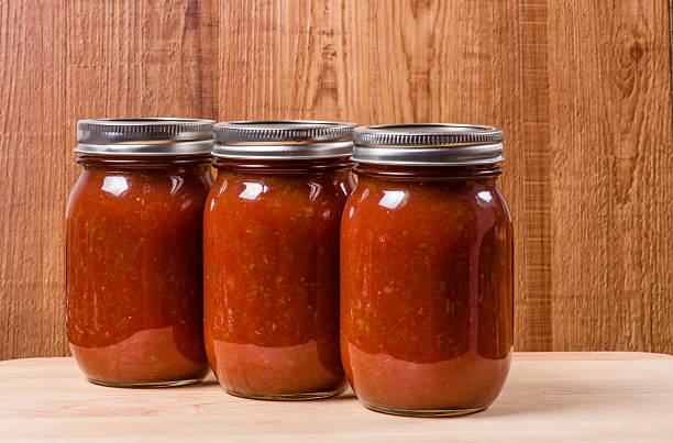 istock Three jars of homemade tomato sauce 532134375